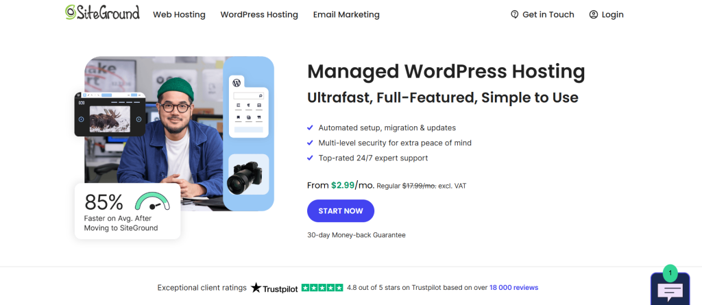 Man sitting at a desk with a computer screen showing WordPress, promotional information about Managed WordPress Hosting services by SiteGround, with pricing and service highlights displayed.